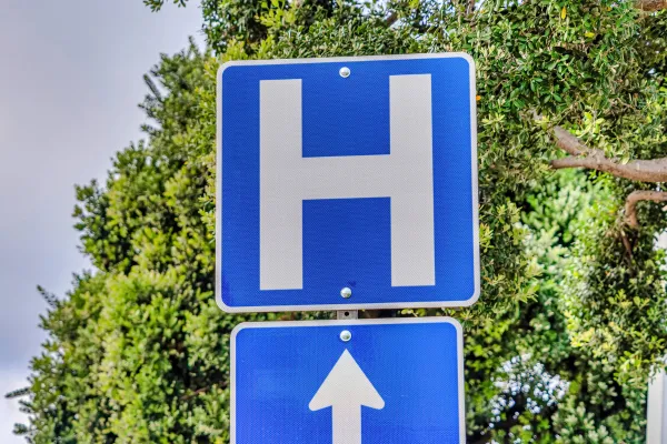 Stock photo of a hospital road sign. Photo credit: Getty Images.