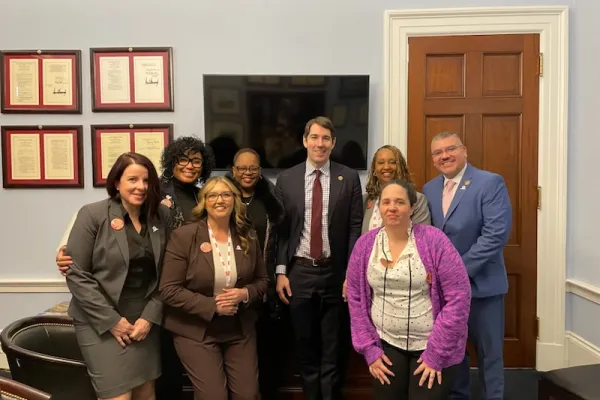 AFSCME members met with Rep. Josh Harder of California (center) on Capitol Hill. Photo courtesy of NENA.