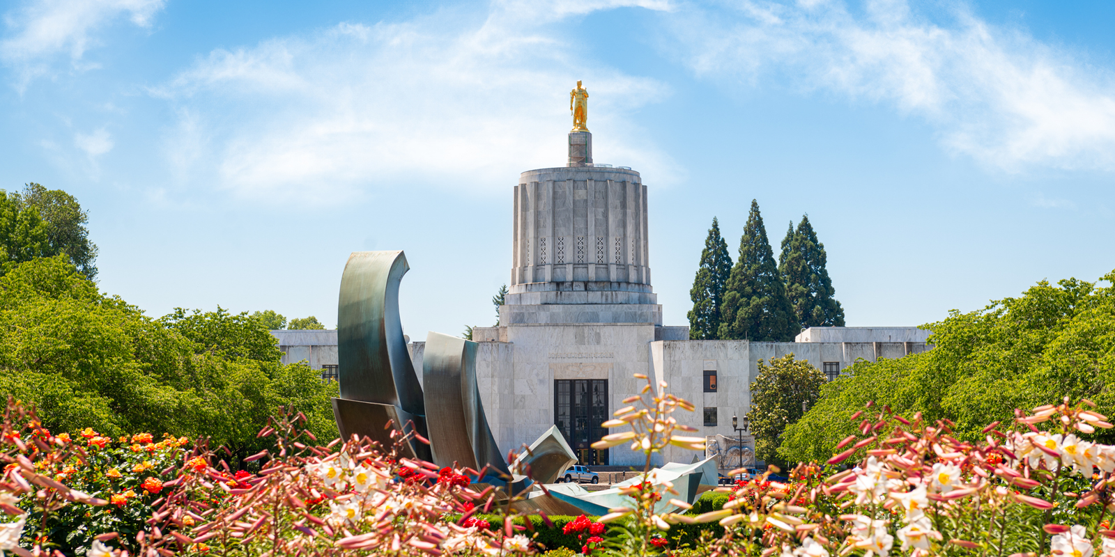 Stock image of Oregon Pioneer on top of the Oregon State Capitol. Photo credit: Sean Pavone/iStock